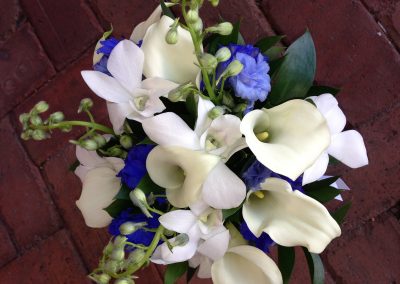 Blue bridal bouquet with white Calla Lillies